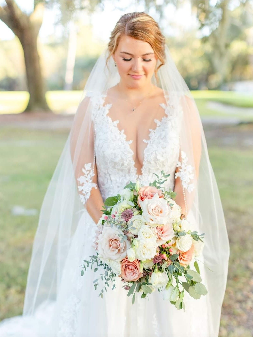 A picture of a bride holding her wedding bouquet