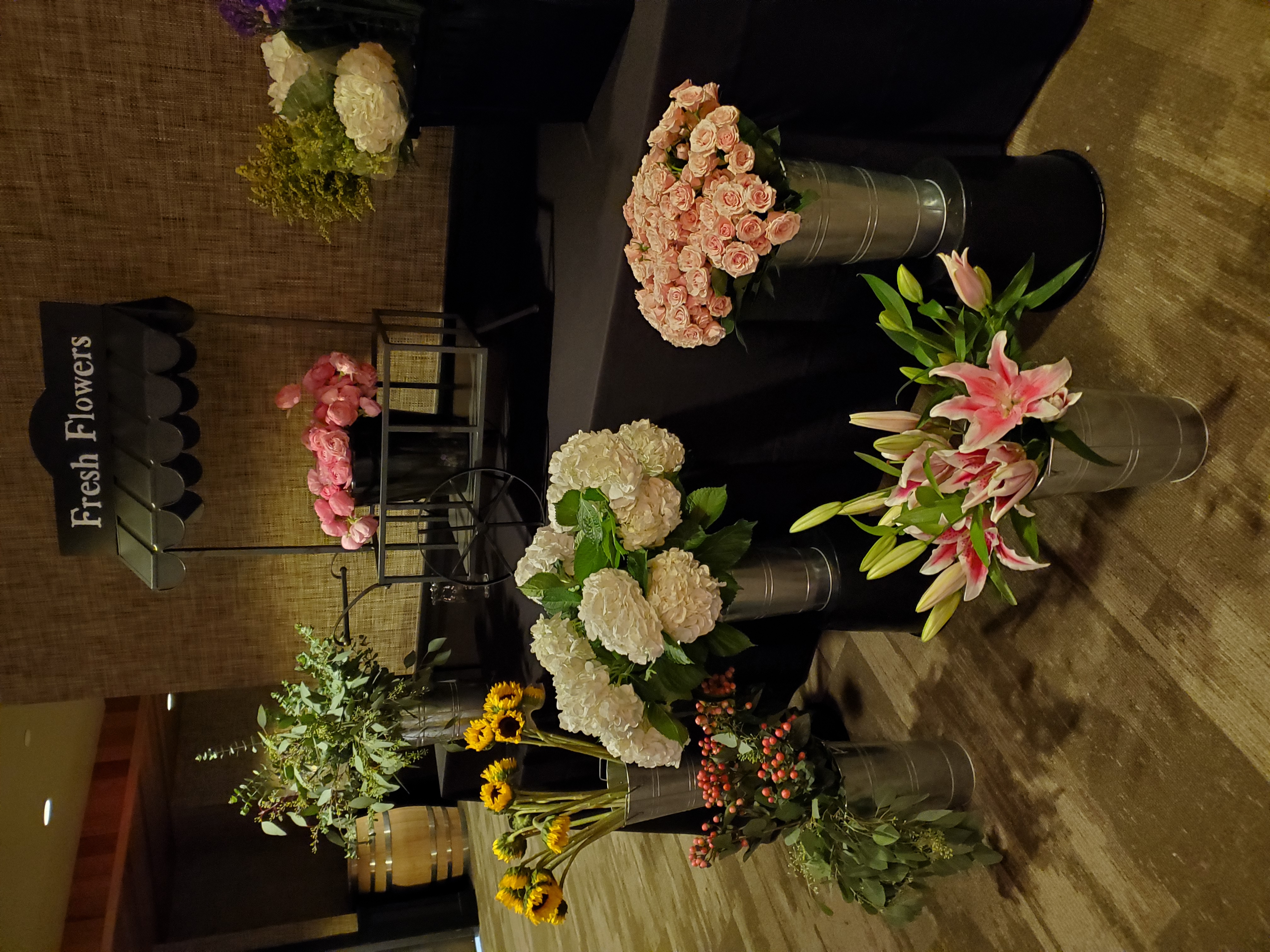 A photo of a variety of flowers about to be used to make bouquets